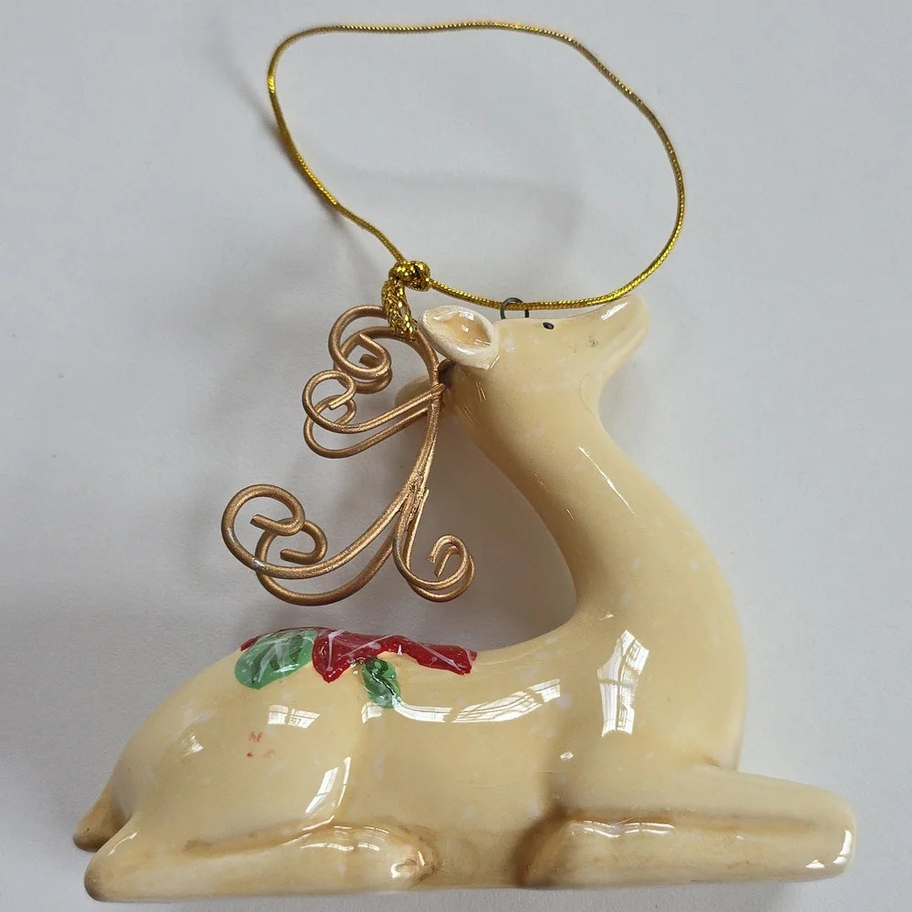 Holiday Reindeer Ornament with Red Flower Accents